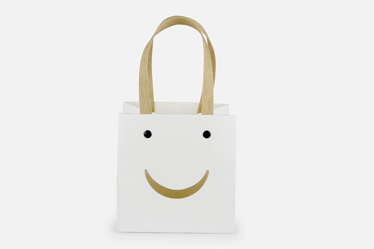 BORSETTA CON SORRISO H12 12X12CM. 12PZ. BIANCO
